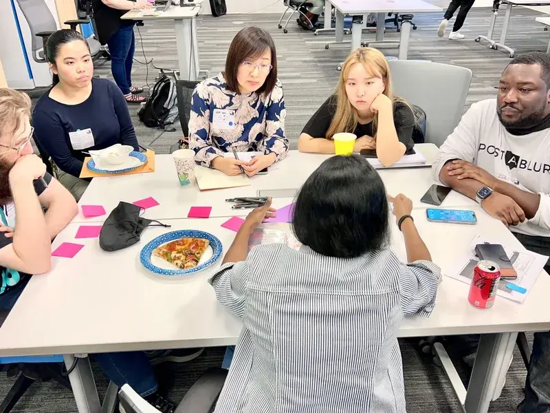 M3+ community members at an event