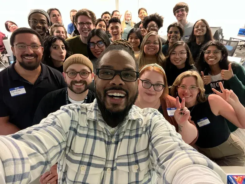 M3+ community members at an event